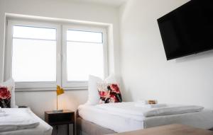Postel nebo postele na pokoji v ubytování BnB Open Apartments Pader-Chill