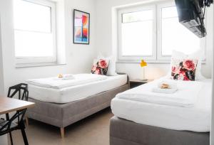 Postel nebo postele na pokoji v ubytování BnB Open Apartments Pader-Chill