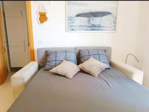 Ένα ή περισσότερα κρεβάτια σε δωμάτιο στο Grace Apartment - Porta di Roma