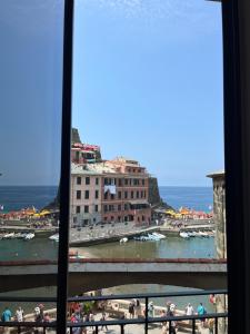 a view of a city from a window at Nicolina 5 Il Cappero in Vernazza