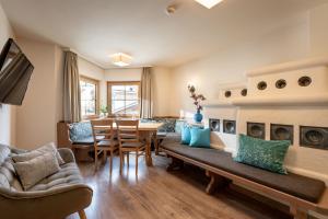 Posezení v ubytování Alpen Glück Hotel Unterm Rain garni