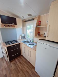 Η κουζίνα ή μικρή κουζίνα στο Bellavista - Fishingcamp