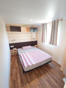 Ένα ή περισσότερα κρεβάτια σε δωμάτιο στο Bellavista - Fishingcamp +19 φωτογραφίες