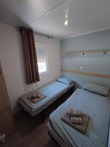 Ένα ή περισσότερα κρεβάτια σε δωμάτιο στο Bellavista - Fishingcamp