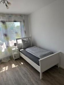 Postel nebo postele na pokoji v ubytování Ferienwohnung in Ettinghausen
