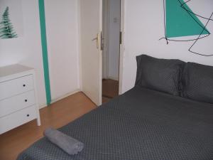 Posteľ alebo postele v izbe v ubytovaní Spark Apartment