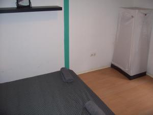 Posteľ alebo postele v izbe v ubytovaní Spark Apartment