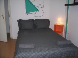 Posteľ alebo postele v izbe v ubytovaní Spark Apartment