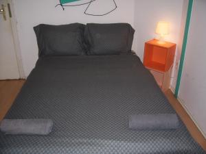 Posteľ alebo postele v izbe v ubytovaní Spark Apartment