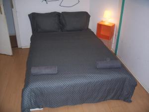 Posteľ alebo postele v izbe v ubytovaní Spark Apartment