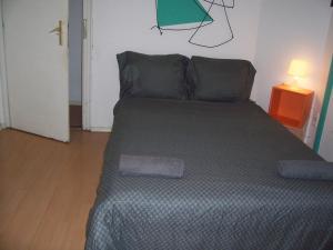 Posteľ alebo postele v izbe v ubytovaní Spark Apartment