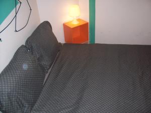 Posteľ alebo postele v izbe v ubytovaní Spark Apartment