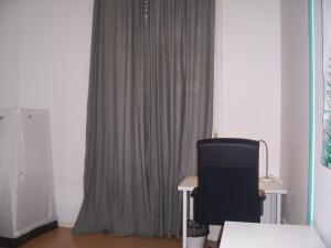 Televízia a/alebo spoločenská miestnosť v ubytovaní Spark Apartment