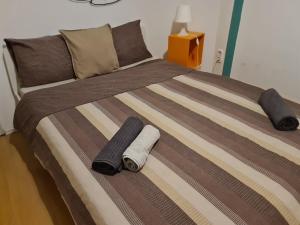 Posteľ alebo postele v izbe v ubytovaní Spark Apartment