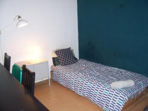 Posteľ alebo postele v izbe v ubytovaní Spark Apartment