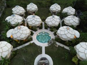 an overhead view of domes at the epcot spheres at Nuanu Suites & Accommodations in Tabanan