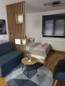 Postel nebo postele na pokoji v ubytování Orca Apartman + 17 fotografií