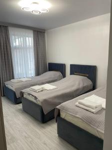 Postel nebo postele na pokoji v ubytování Edelweiss 2