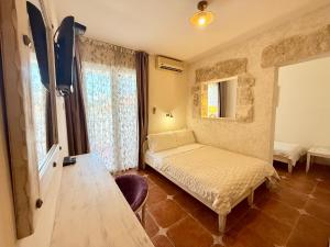 Postel nebo postele na pokoji v ubytování Villa Perla Di Mare Budva