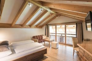 Letto o letti in una camera di Hotel Nussbaumerhof ***