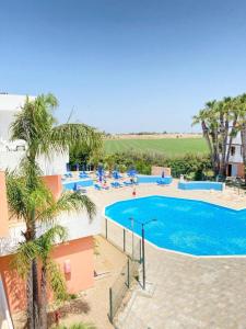 an image of a swimming pool at a resort at Villette Mar Ionio in Nardò