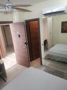 Posteľ alebo postele v izbe v ubytovaní Enter Rooms