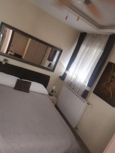 Posteľ alebo postele v izbe v ubytovaní Enter Rooms