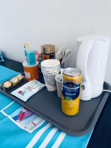 a tray with various items on a table at RELAXED LIVING No 03 Hillside Oslo in Oslo