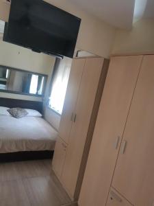 Posteľ alebo postele v izbe v ubytovaní Enter Rooms + 8 fotografií