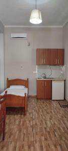 Kuchyň nebo kuchyňský kout v ubytování Duka Rooms