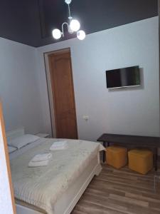 Letto o letti in una camera di Mango's Guesthouse