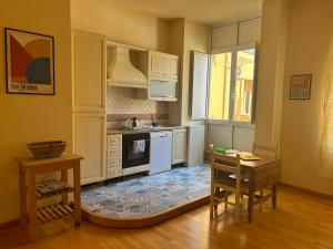 Η κουζίνα ή μικρή κουζίνα στο Cinque&Cinque Casa Vacanze +6 φωτογραφίες
