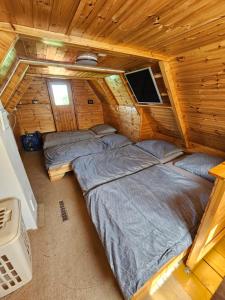 Postel nebo postele na pokoji v ubytování Chata Trhovka