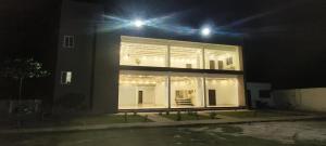 a building with lights on top of it at night at Ramashish Palace in Chākia