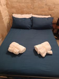 Letto o letti in una camera di Mary Home