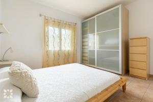 Posteľ alebo postele v izbe v ubytovaní Villa Ponte Vecchio by Abahana Villas