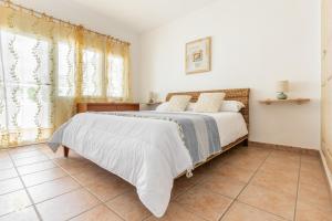Posteľ alebo postele v izbe v ubytovaní Villa Ponte Vecchio by Abahana Villas