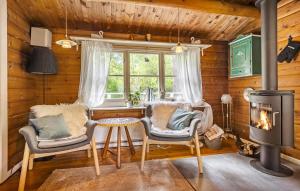 Posezení v ubytování Holiday Home Gubbegårdsvejen Nexø Ii