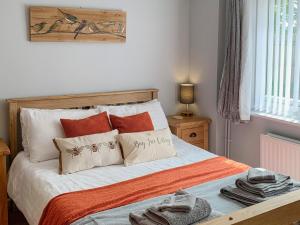 Postel nebo postele na pokoji v ubytování Bay Tree Cottage + 13 fotografií