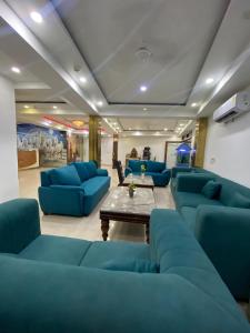 Posezení v ubytování Hotel Aman Inn