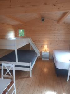 Postel nebo postele na pokoji v ubytování Búdardalur glamping