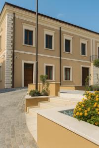 a rendering of a building with flowers in front at Casa Stella in Crotone