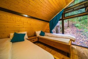 Postel nebo postele na pokoji v ubytování Chalet Nune