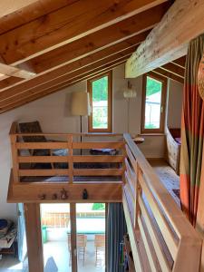a bedroom with two bunk beds in a house at Ferienwohnung Baltensperger in Andeer