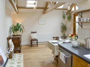 Køkken eller tekøkken på The Coach House