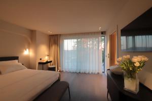 Ένα ή περισσότερα κρεβάτια σε δωμάτιο στο Azienda Agricola Galliussi