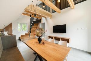 TV a/nebo společenská místnost v ubytování Family apartments Soča Splash Home