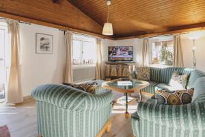 Μια τηλεόραση ή/και κέντρο ψυχαγωγίας στο Ferienhaus Hohe Tauern in Piesendorf