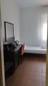 Voodi või voodid majutusasutuse MC Hotel toas