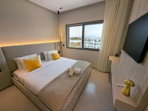 Postel nebo postele na pokoji v ubytování EliteStay by Al Amir + 37 fotografií